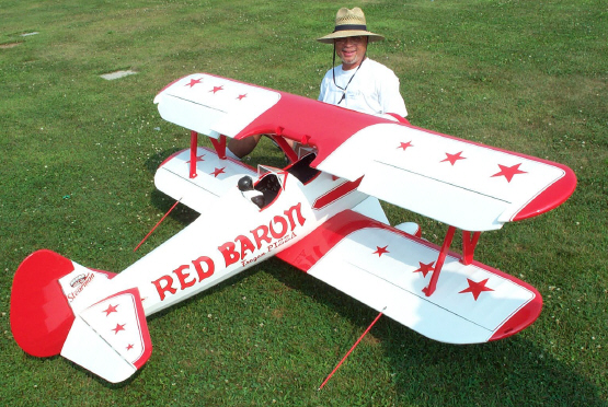 Joe Wilkins and his Red Baron. Hey Joe bring some pizza out to the field sometime.